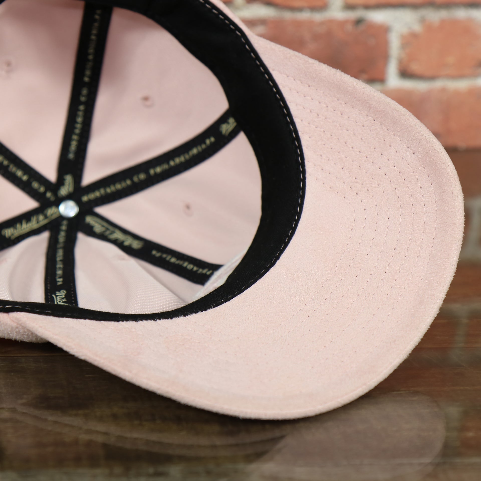 pink under visor on the Cleveland Cavaliers Micro Suede Pink Dad Hat