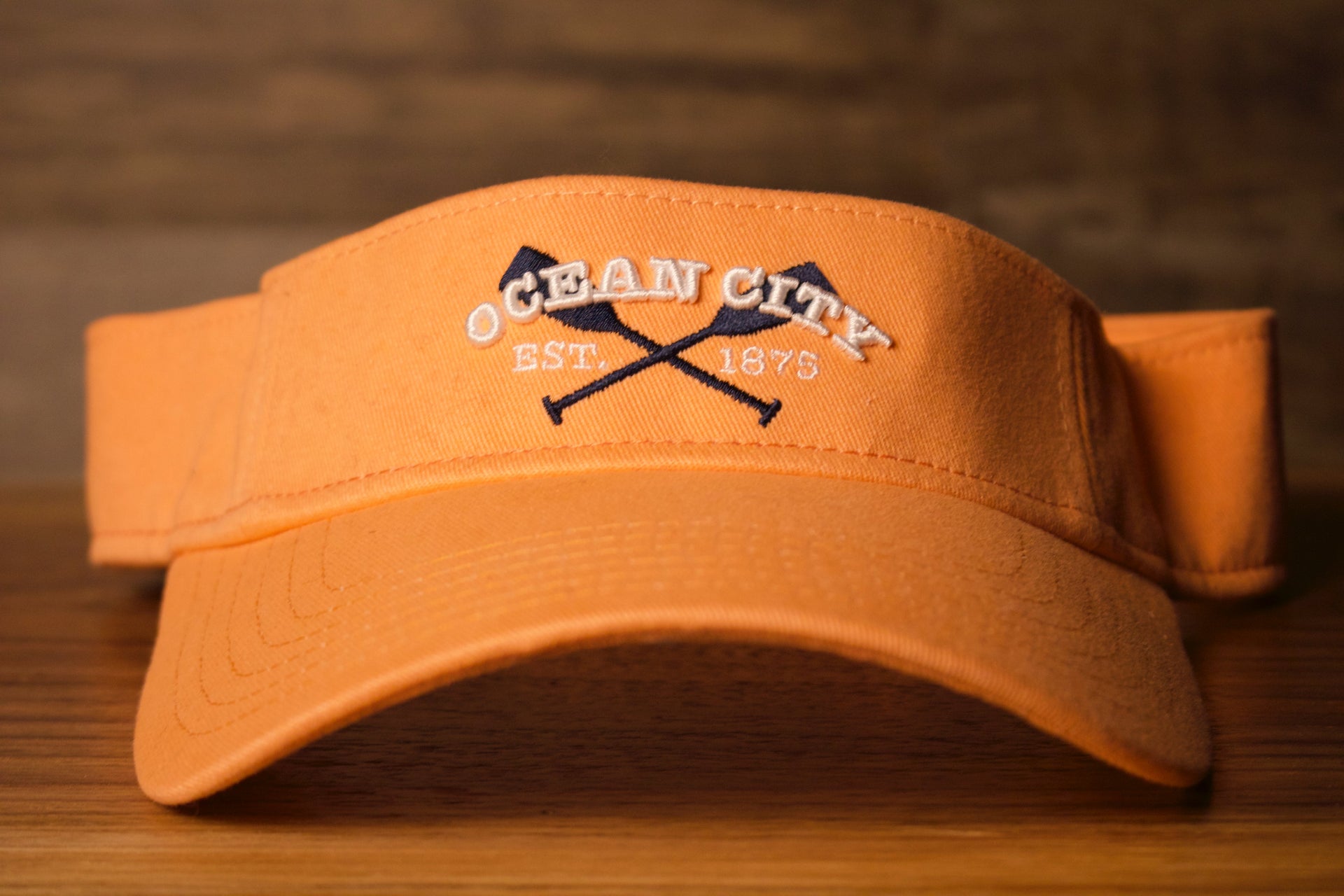 Ocean City Visor | OCNJ Adjustable Visor | Coral Peach | OSFM on the front is ocean city and the year it was founded