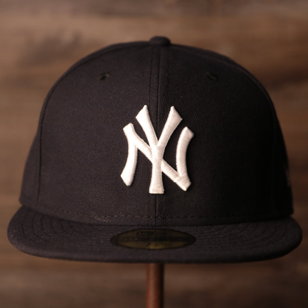 Yankees Black Bottom Fitted Cap | New York Yankees On-Field Black Underbrim Fitted Hat the front of this yankees cap is black with the yankees logo in the crown