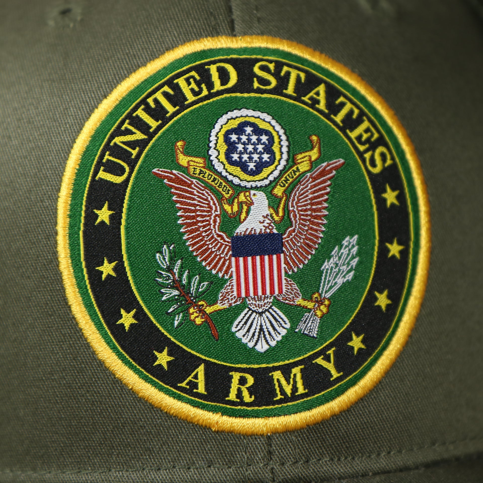 seal on the front of the US Army Seal Logo Mesh Back Olive Trucker Snapback Hat | Olive OSFM