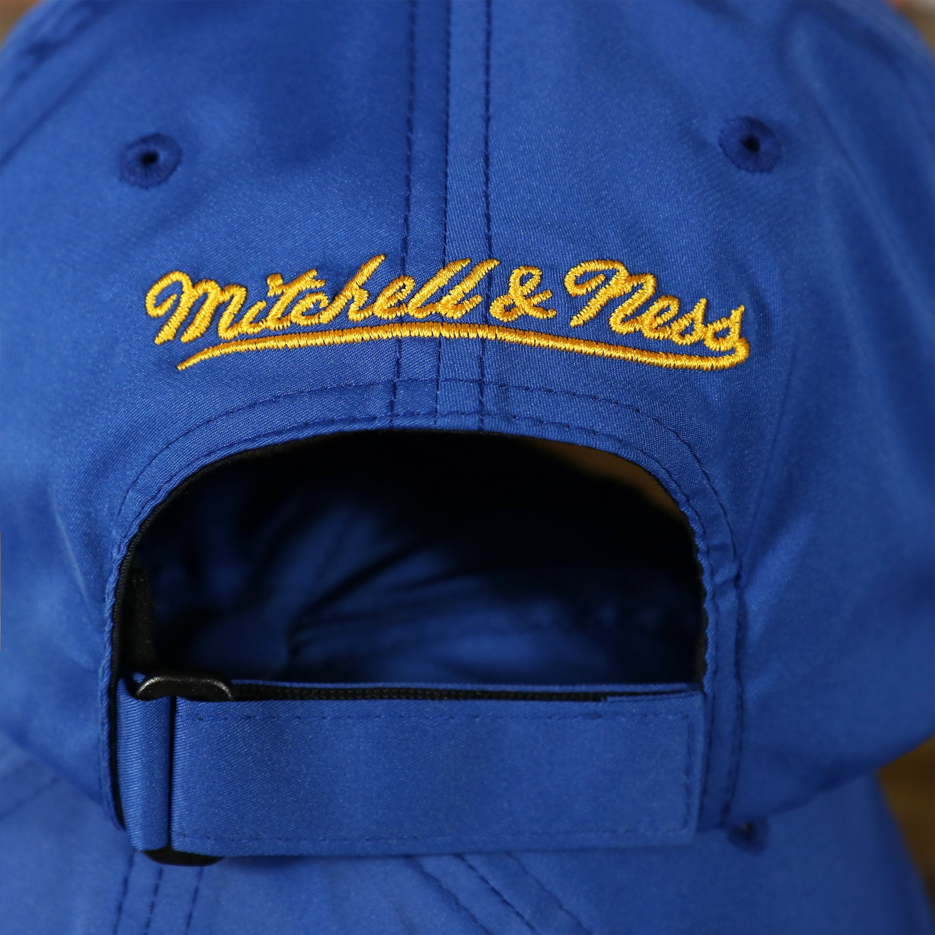 mitchell and ness logo on the Golden State Warriors Dry Poly Blue Dad Hat