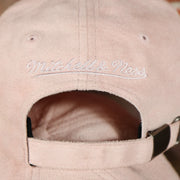 mitchell and ness logo on the Philadelphia 76ers Micro Suede Pink Adjustable Baseball Cap