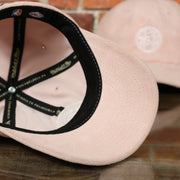 pink under visor on the Philadelphia 76ers Micro Suede Pink Adjustable Baseball Cap