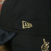 new era logo on the Cleveland Cavaliers 2017 NBA On Court Player Worn Black and Gold 920 Dad Hat