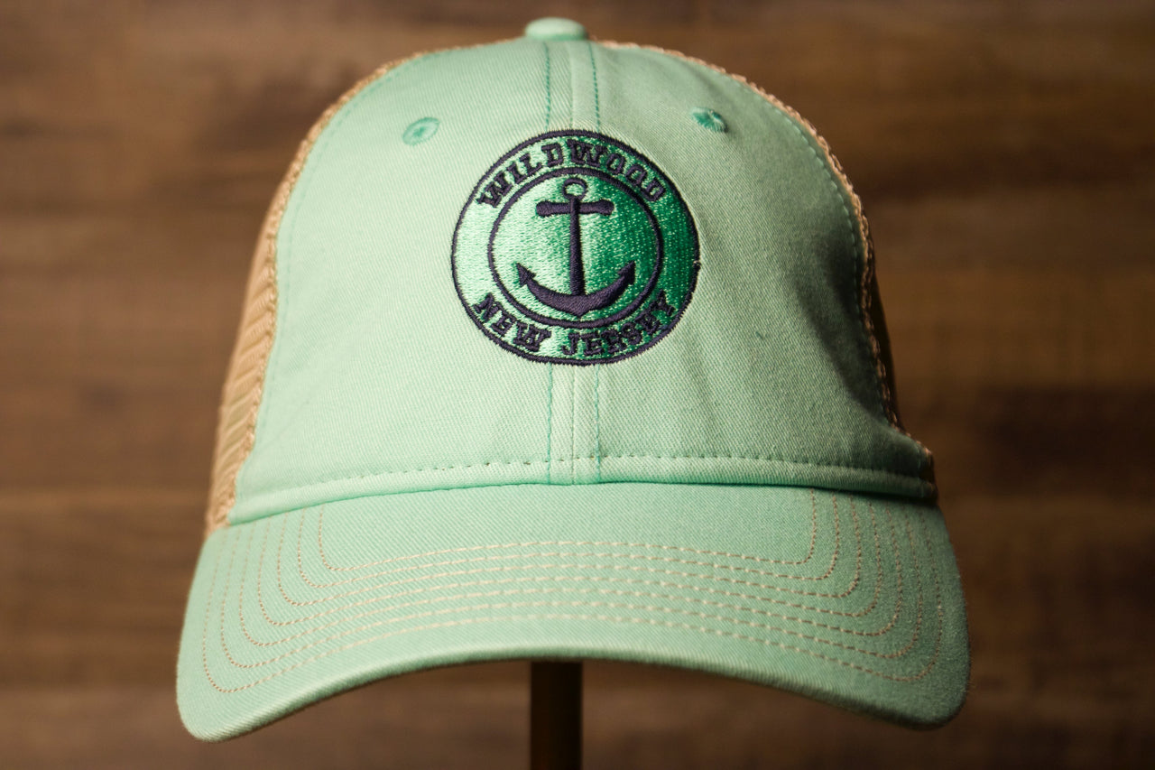 Wildwood New Jersey Mint Green / Khaki Mesh-Back Trucker Hat the front of this hat has the name and state in a circle with an anchor in the middle