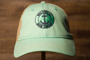 Wildwood New Jersey Mint Green / Khaki Mesh-Back Trucker Hat the front of this hat has the name and state in a circle with an anchor in the middle 