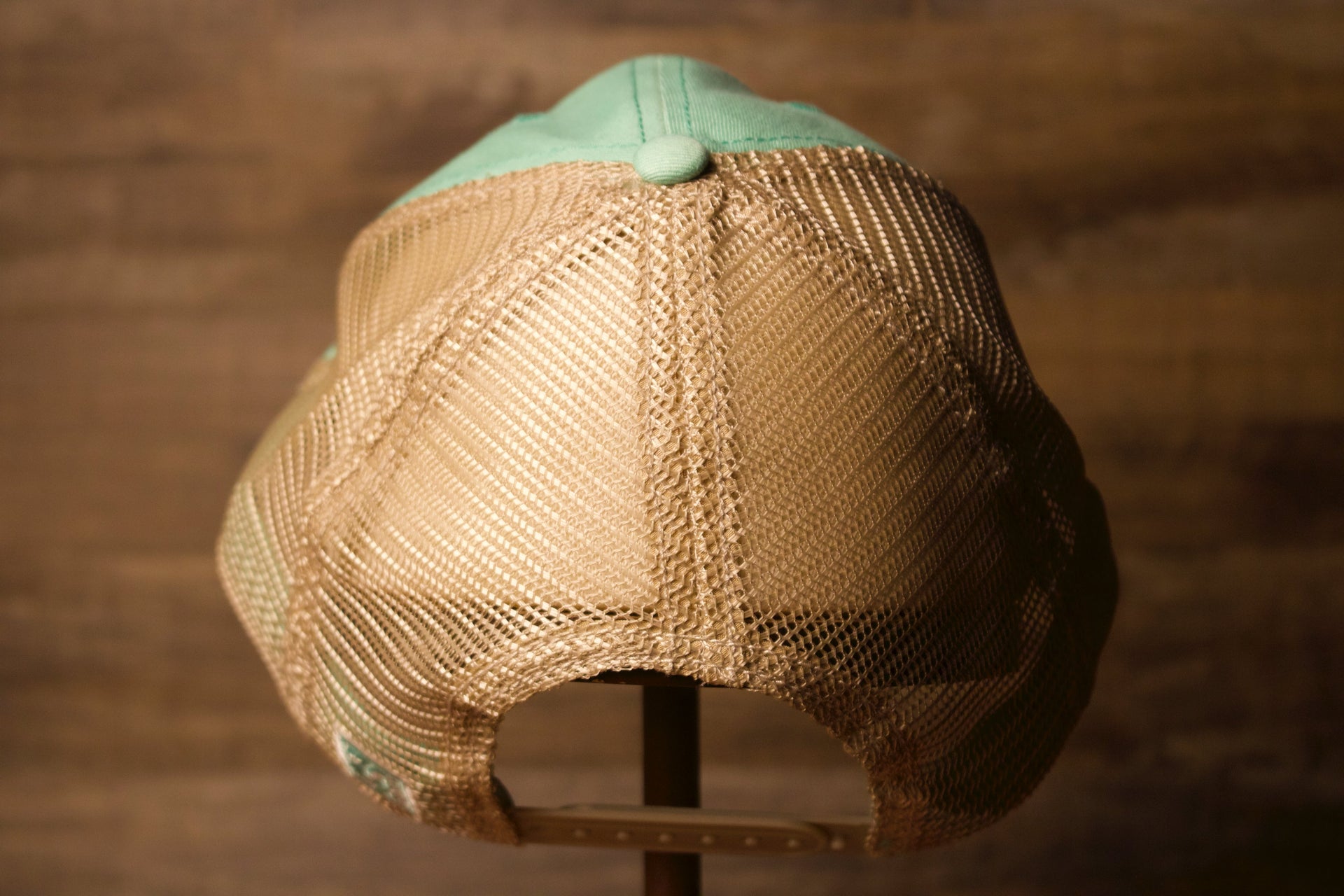 the back is a trucker style Wildwood New Jersey Mint Green / Khaki Mesh-Back Trucker Hat