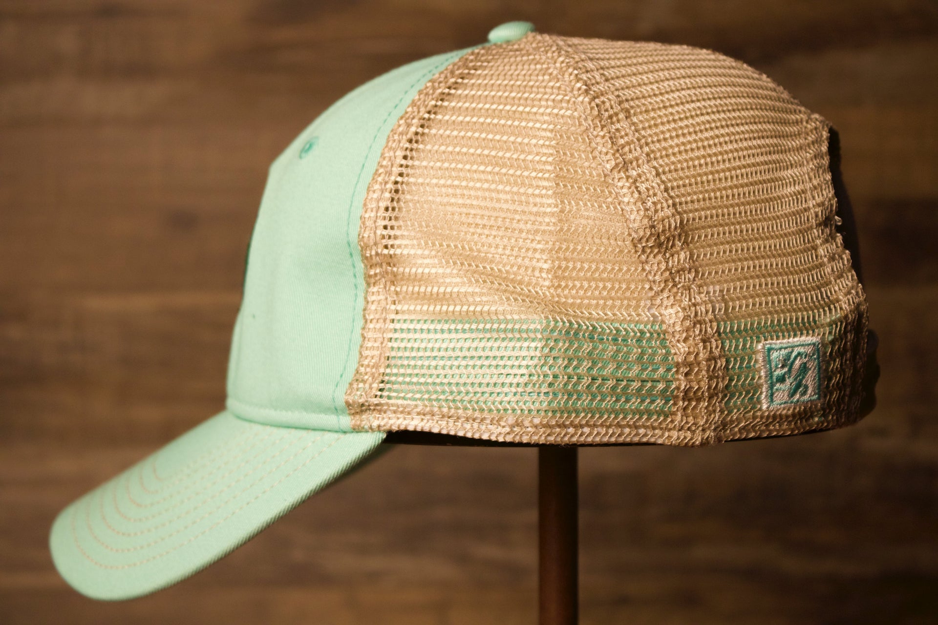 the wearers left Side is a trucker style as well Wildwood New Jersey Mint Green / Khaki Mesh-Back Trucker Hat