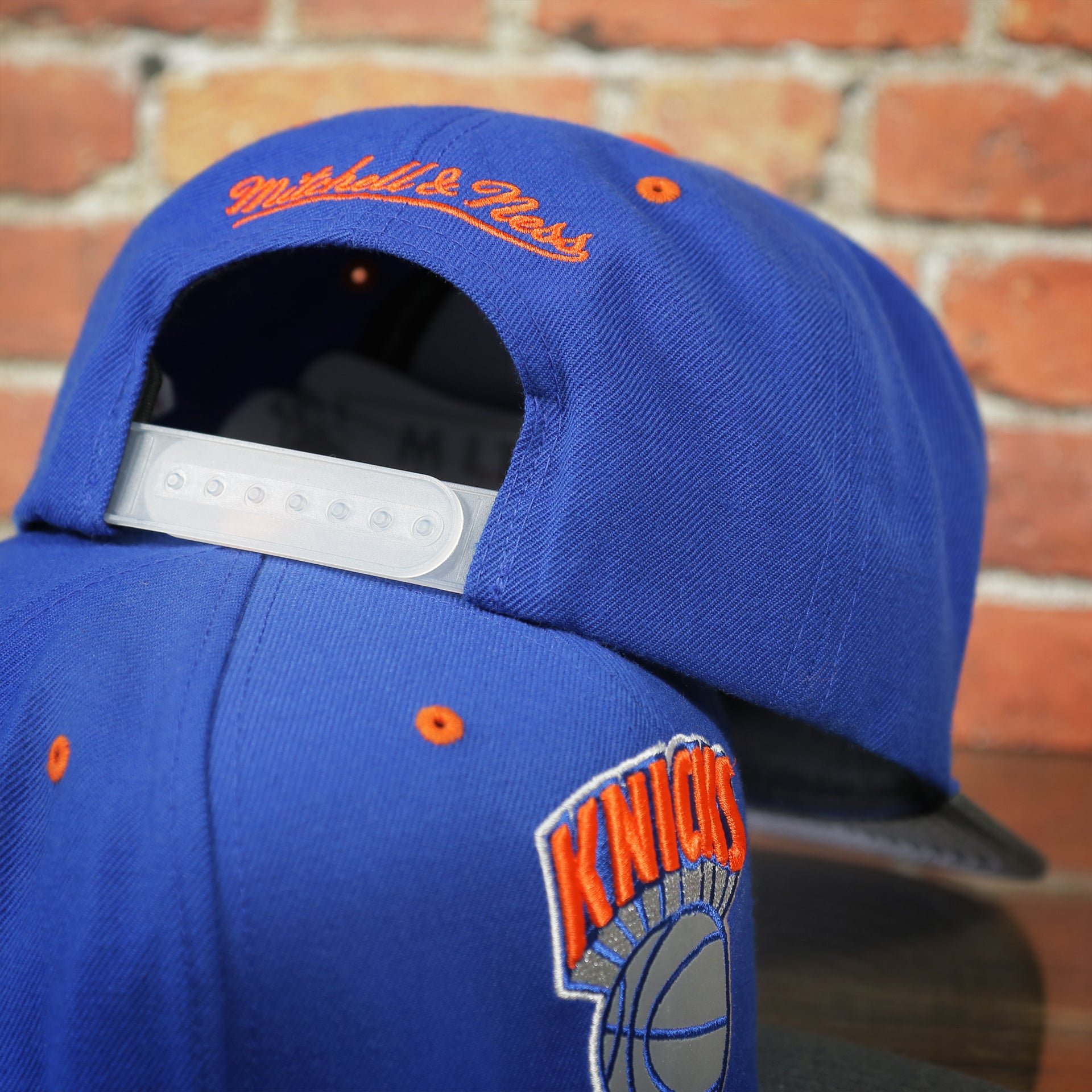 adjustable snap on the Knicks Gray Bottom Snapback | New York Knicks Retro Grey Bottom Snap Cap