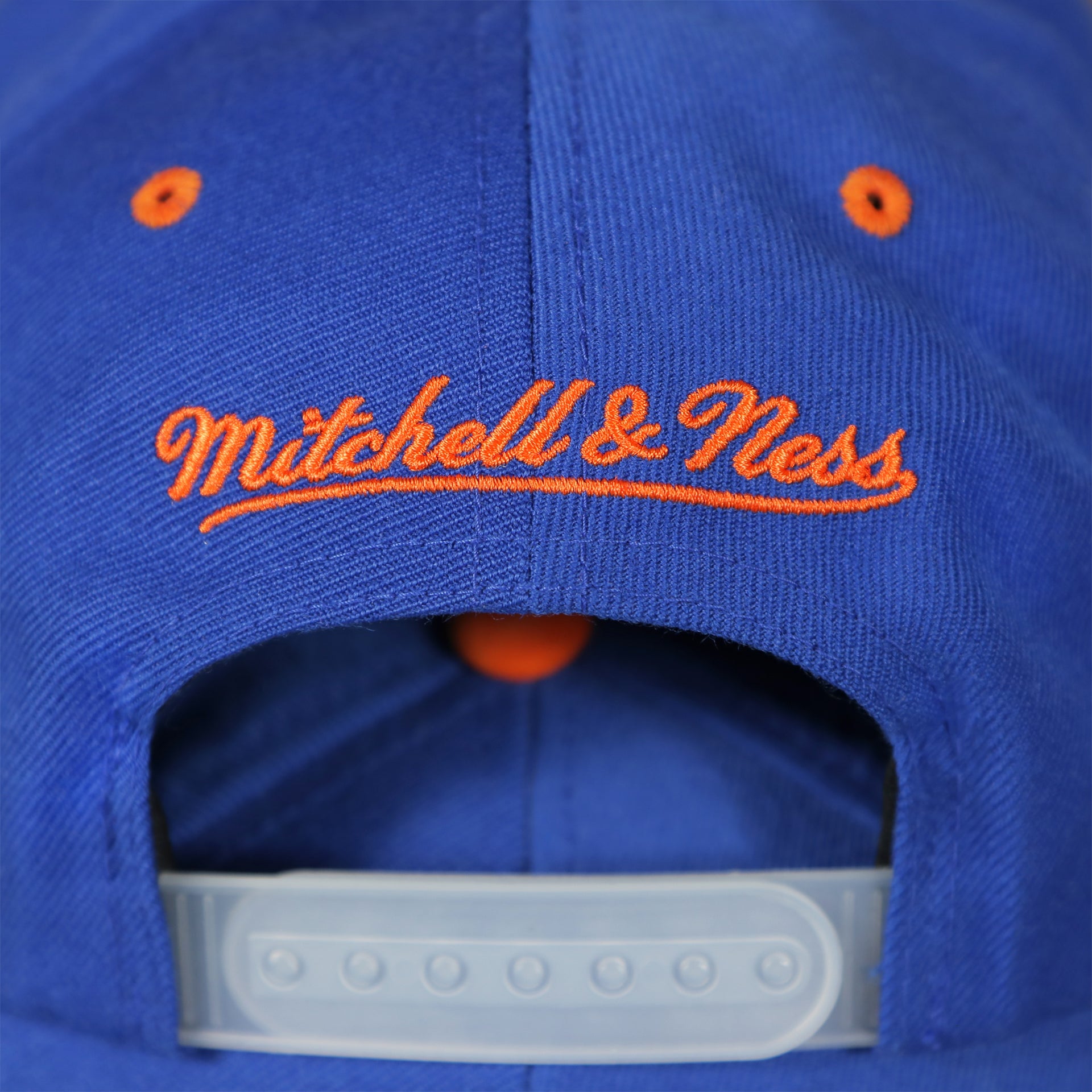 mitchell and ness logo on the Knicks Gray Bottom Snapback | New York Knicks Retro Grey Bottom Snap Cap