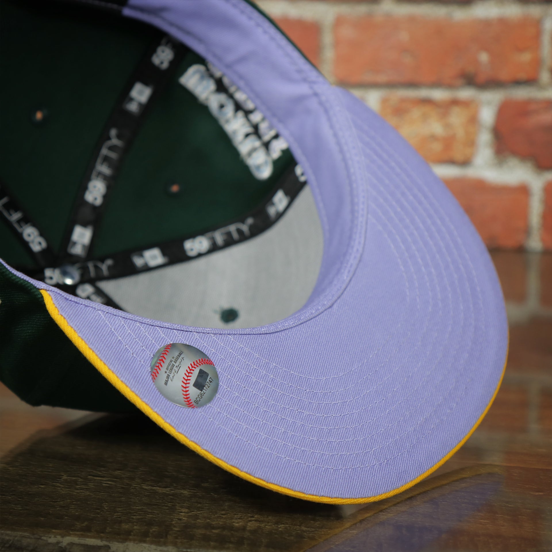 purple under visor on the Oakland Athletics Pop Sweat Pastel World Series Side Patch Fitted Cap With Purple Undervisor | Green 59Fifty Cap