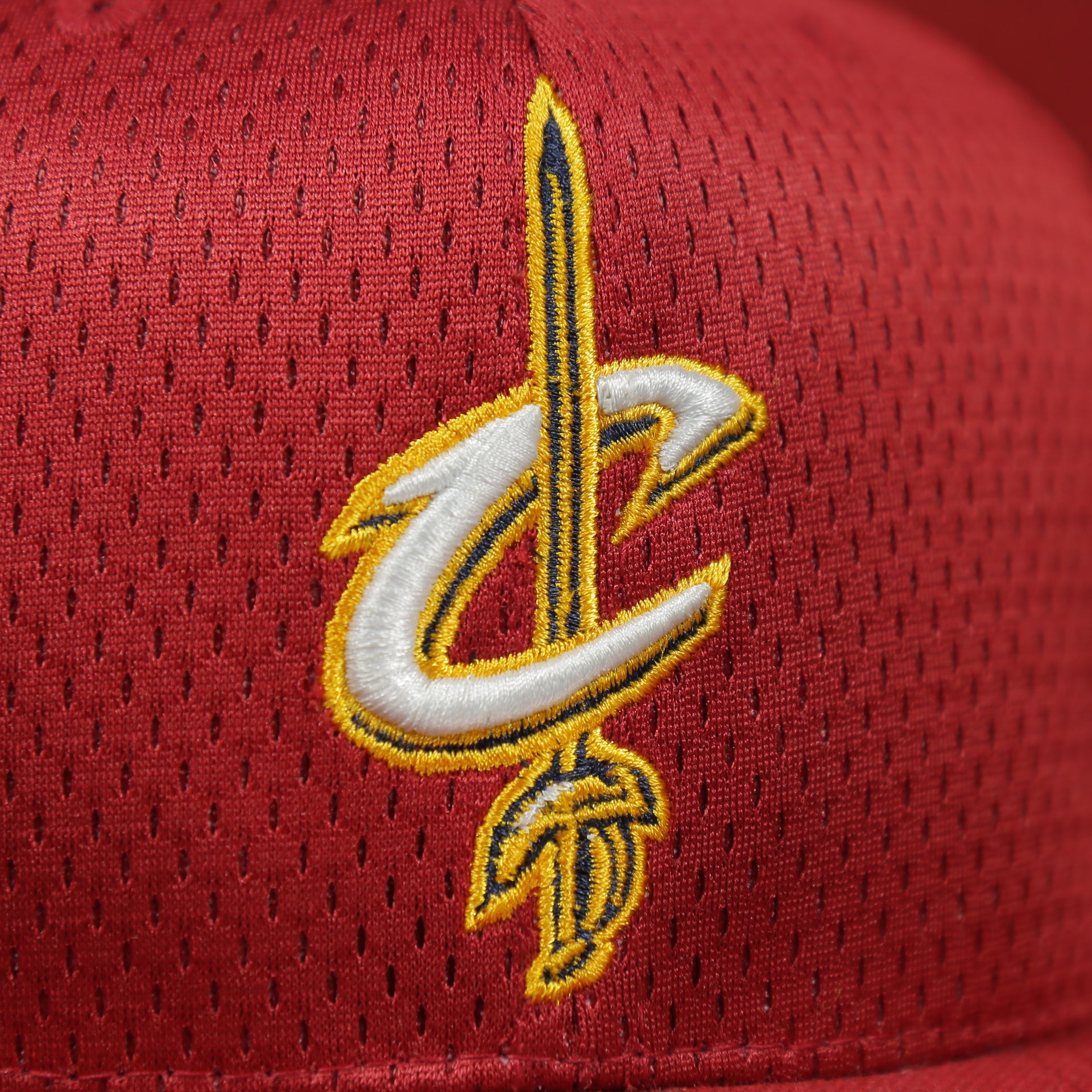 cavaliers logo on the Cleveland Cavaliers Maroon Mesh Jersey Snapback Hat