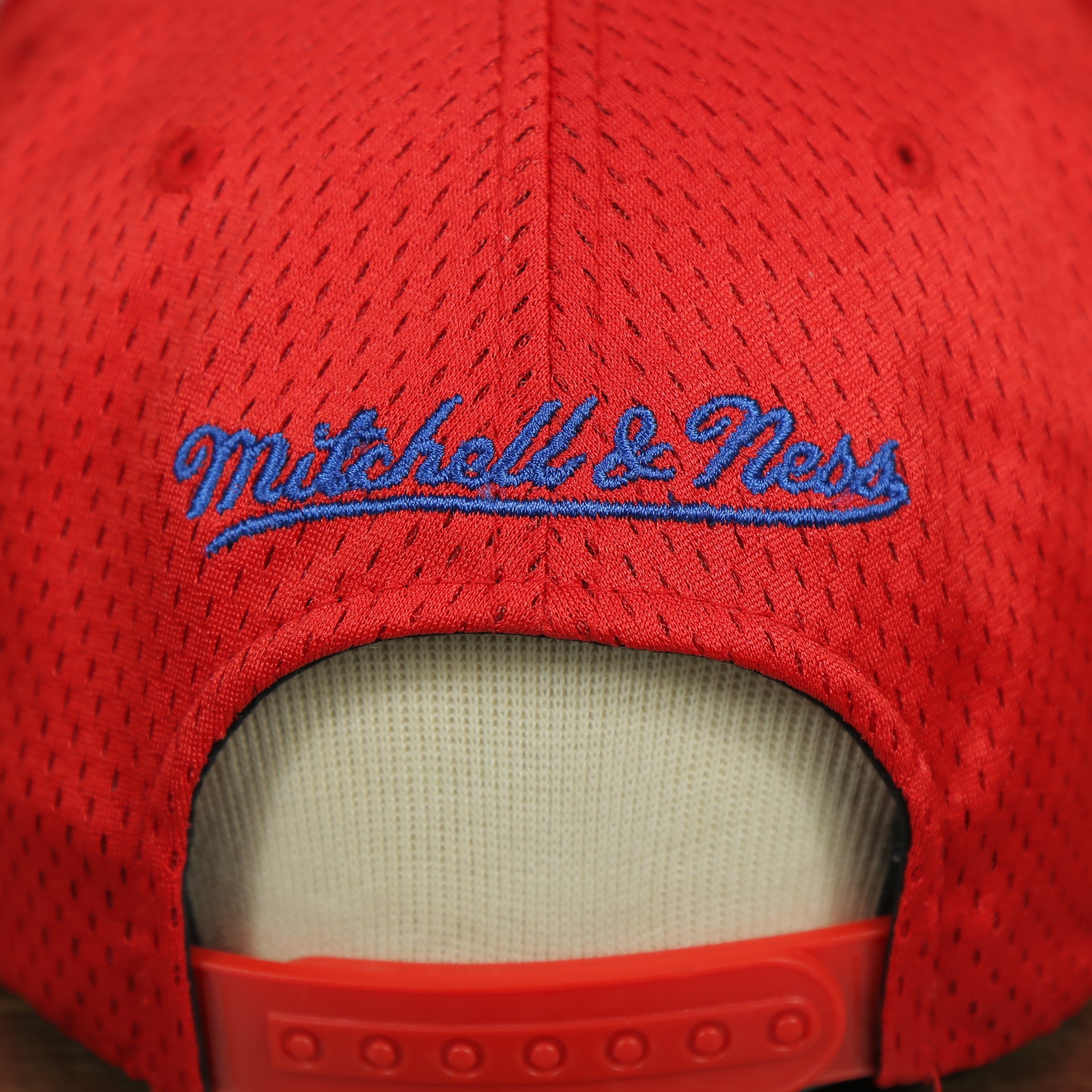 mitchell and ness logo on the Los Angeles Clippers Red Mesh Jersey Snapback Hat