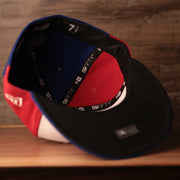The inside of the New Era 59fifty with a black underbrim made for the Expos.