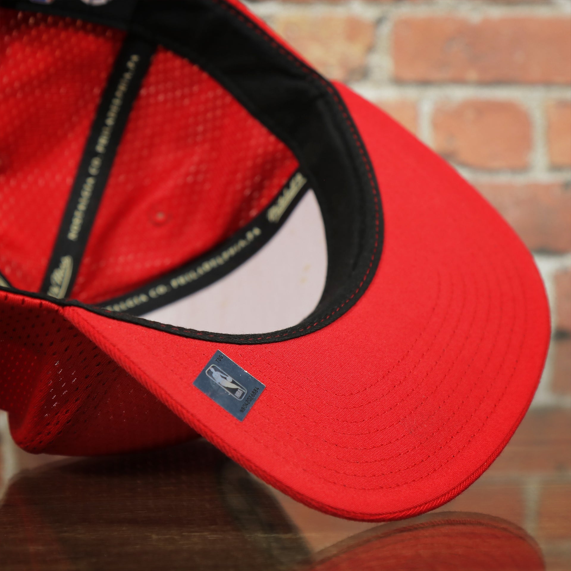 red under visor on the Los Angeles Clippers Red Mesh Jersey Snapback Hat