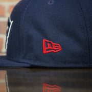 new era logo on the New England Patriots Throwback 4X Super Bowl Champions Snapback Hat