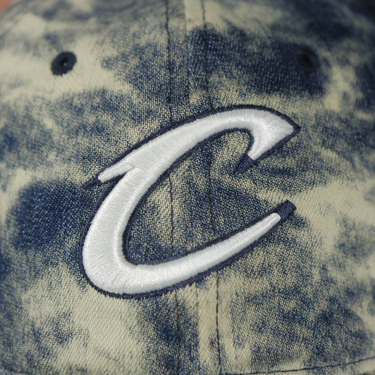 cavaliers logo on the Cleveland Cavaliers Acid Wash Denim Dad Hat