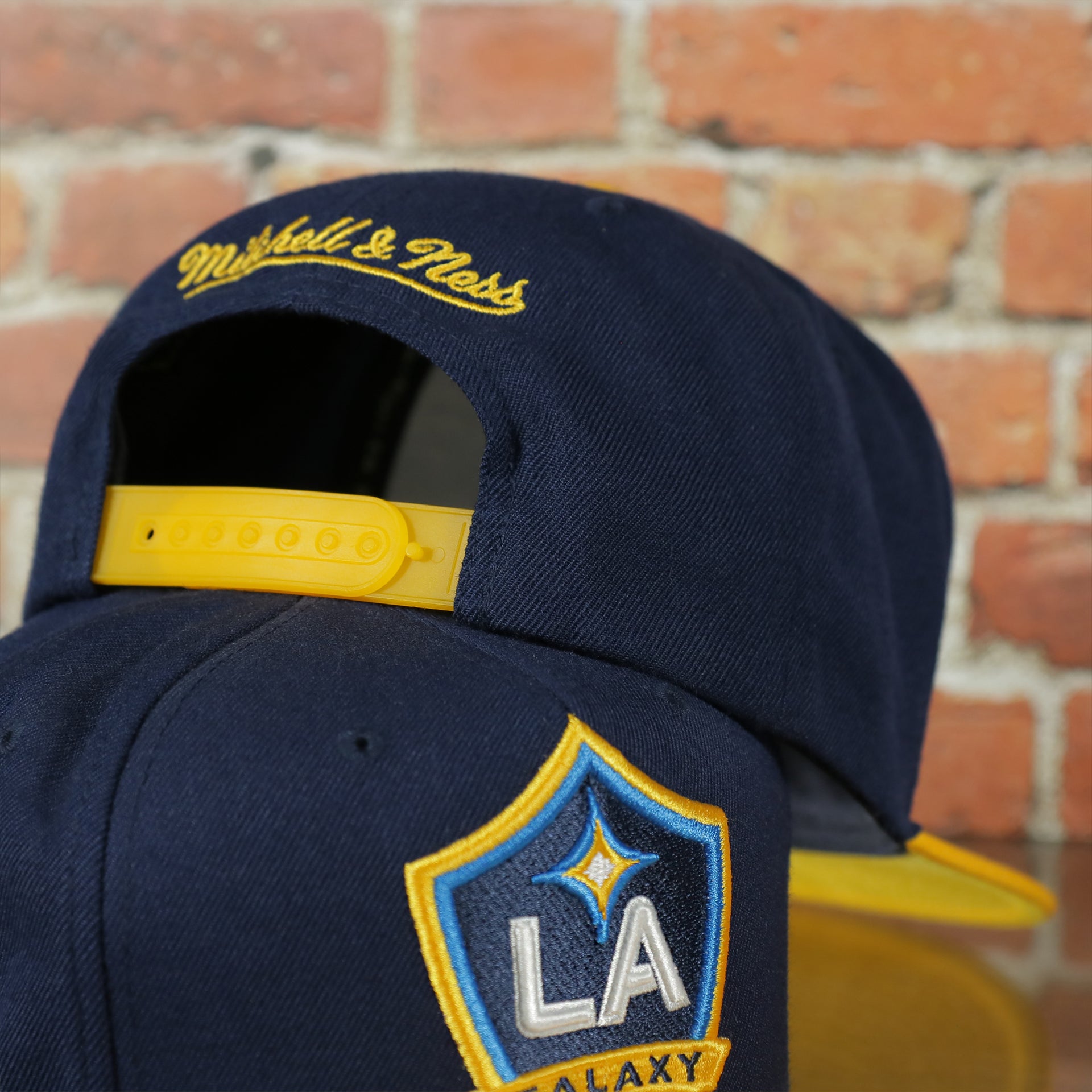 yellow adjustable snap on the Los Angeles Galaxy Two Tone Snapback Hat