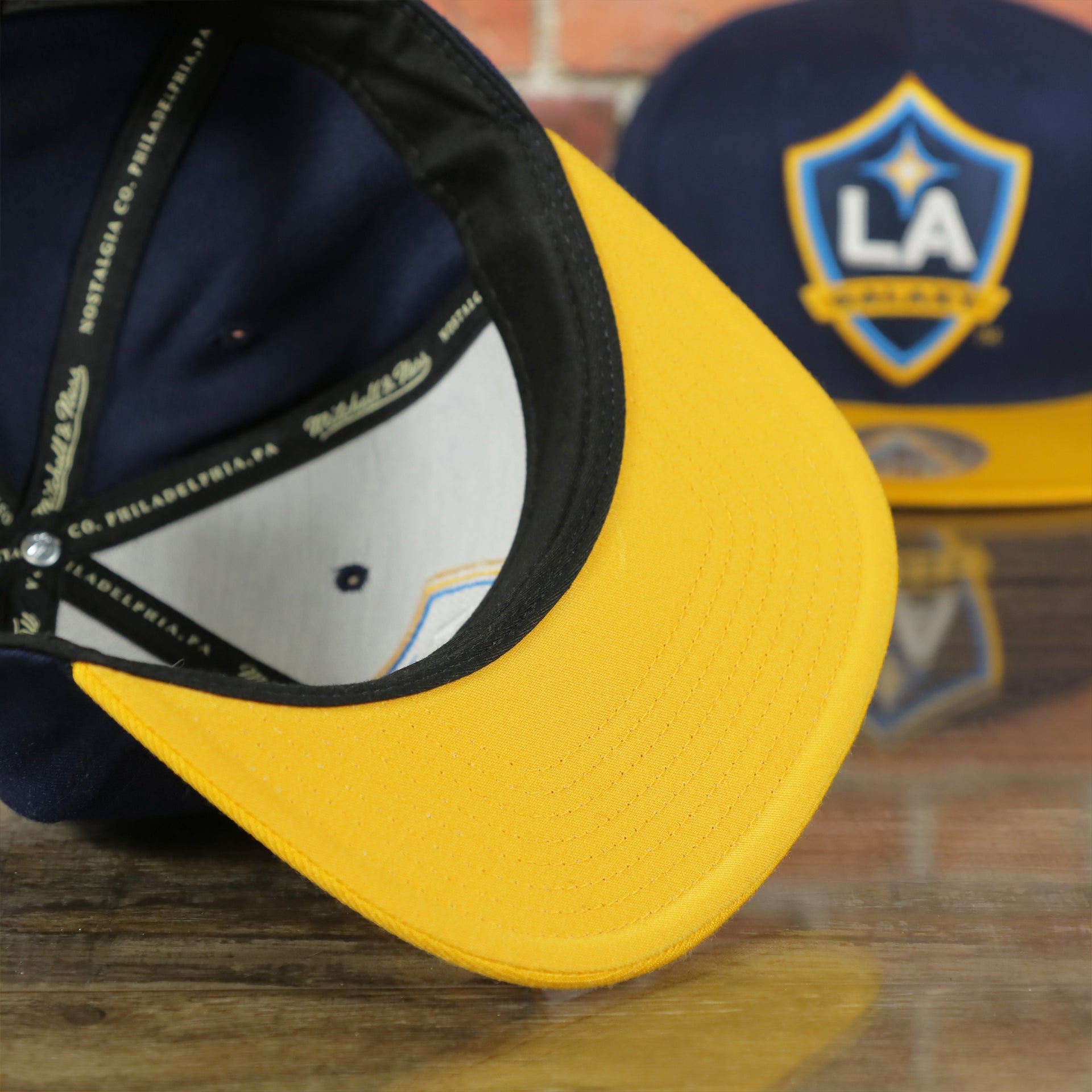 yellow under visor on the Los Angeles Galaxy Two Tone Snapback Hat
