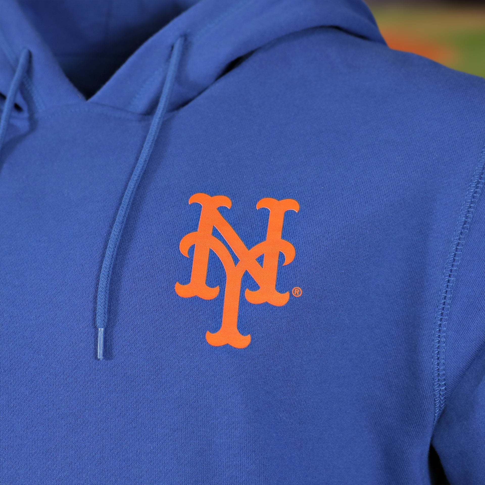 mets logo on the New York Mets "City Cluster" 59Fifty Fitted Matching Royal Pullover Hoodie
