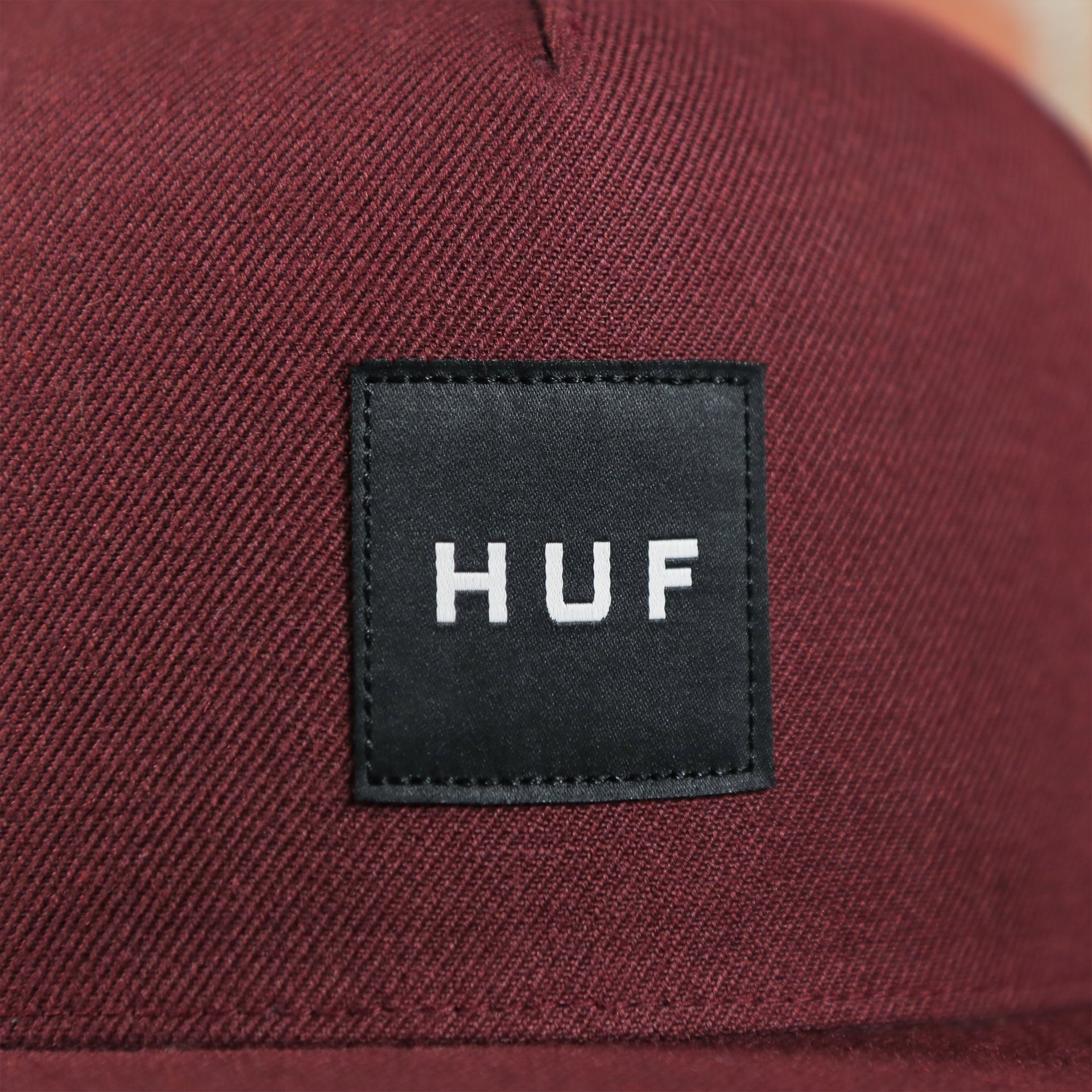 huf logo on the front of the Philadelphia Eagles Sun Fade Pierce Kelly Green Pullover Hoodie | Elm Green