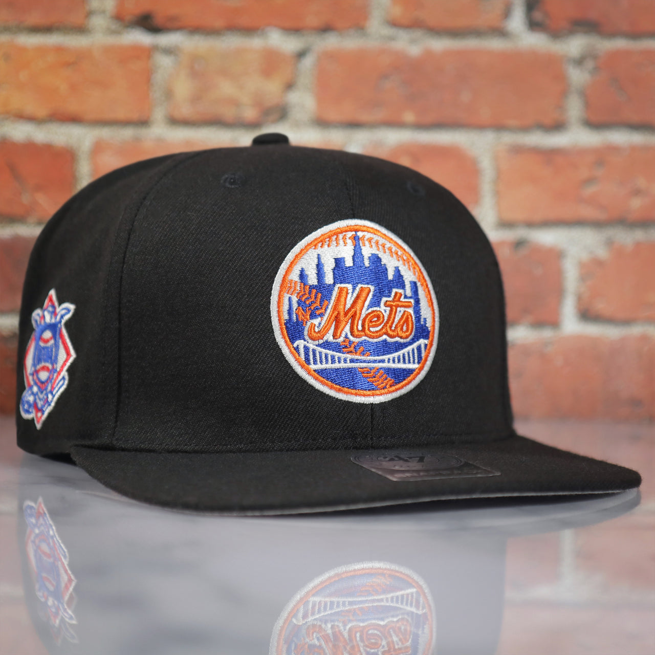 front of the New York Mets Sure Shot Captain Side Patch Black Snapback | OSFM
