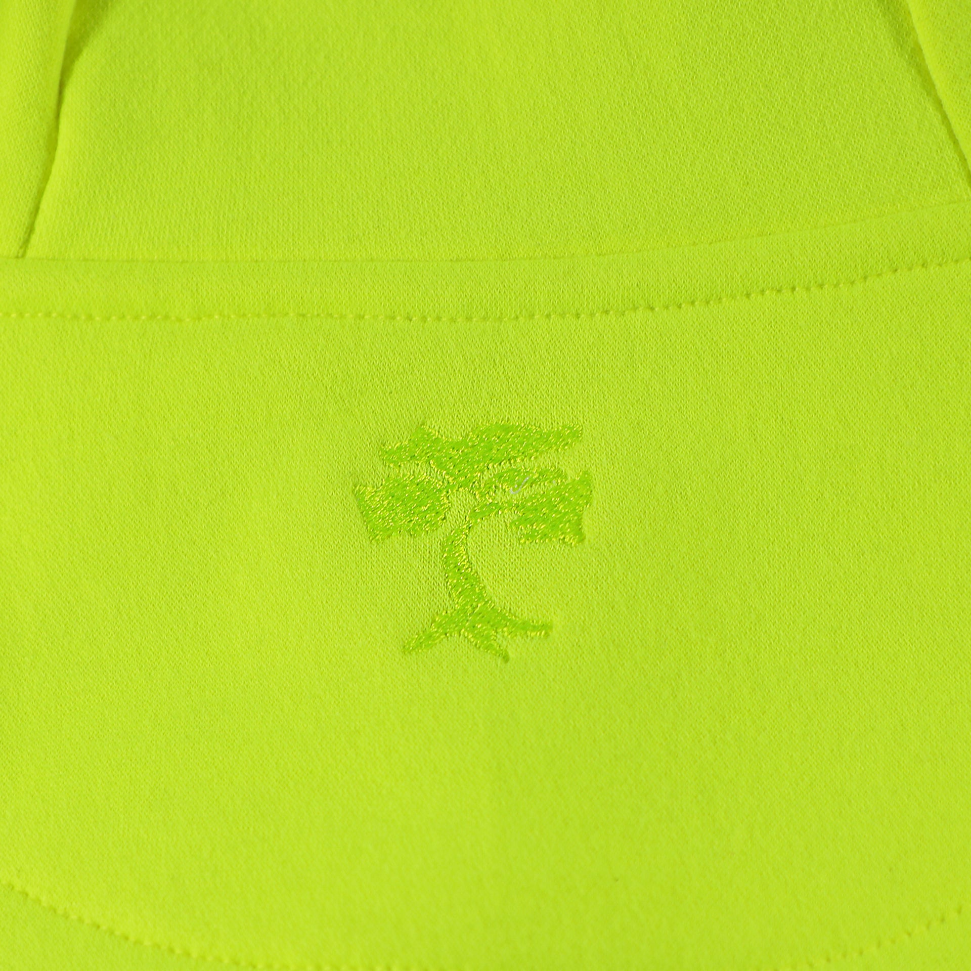 bonsai tree logo on the Frozen Yellow Unbasic Fleece Stash Pocket Sunset Park Tapered Zipper Hoodie | Fleece Neon Yellow Hoodie