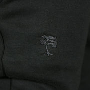 bonsai tree logo on the Jet Black Unbasic Fleece Stash Pocket Sunset Park Tapered Jogger Pants | Fleece Black Sweatpants