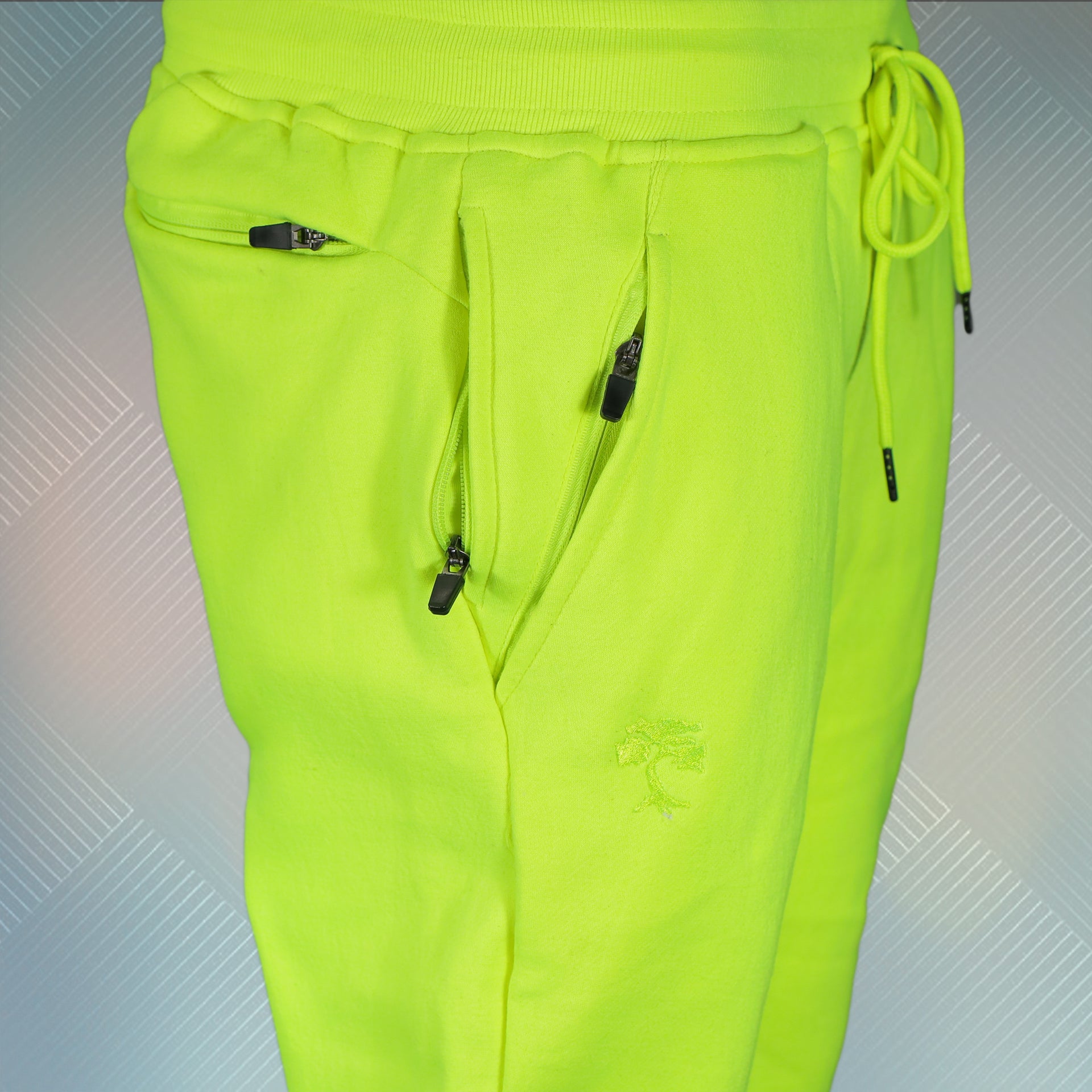 wearers right of the Frozen Yellow Unbasic Fleece Stash Pocket Sunset Park Tapered Jogger Pants | Fleece Neon Yellow Sweatpants