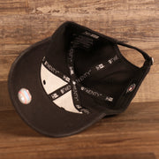 new era taping on the adjustable strap on the Philadelphia Phillies Core Classic Black logo on White Trim | Black 9Twenty Dad Hat