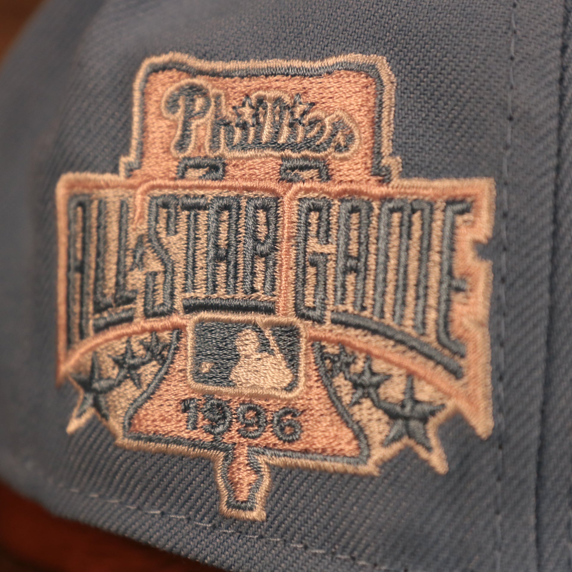 Close up of the 1996 All Star Game Patch on the wearer's right of the Philadelphia Phillies 1996 All Star Game Icy Blue Pink Bottom Side Patch 59Fifty Fitted Cap