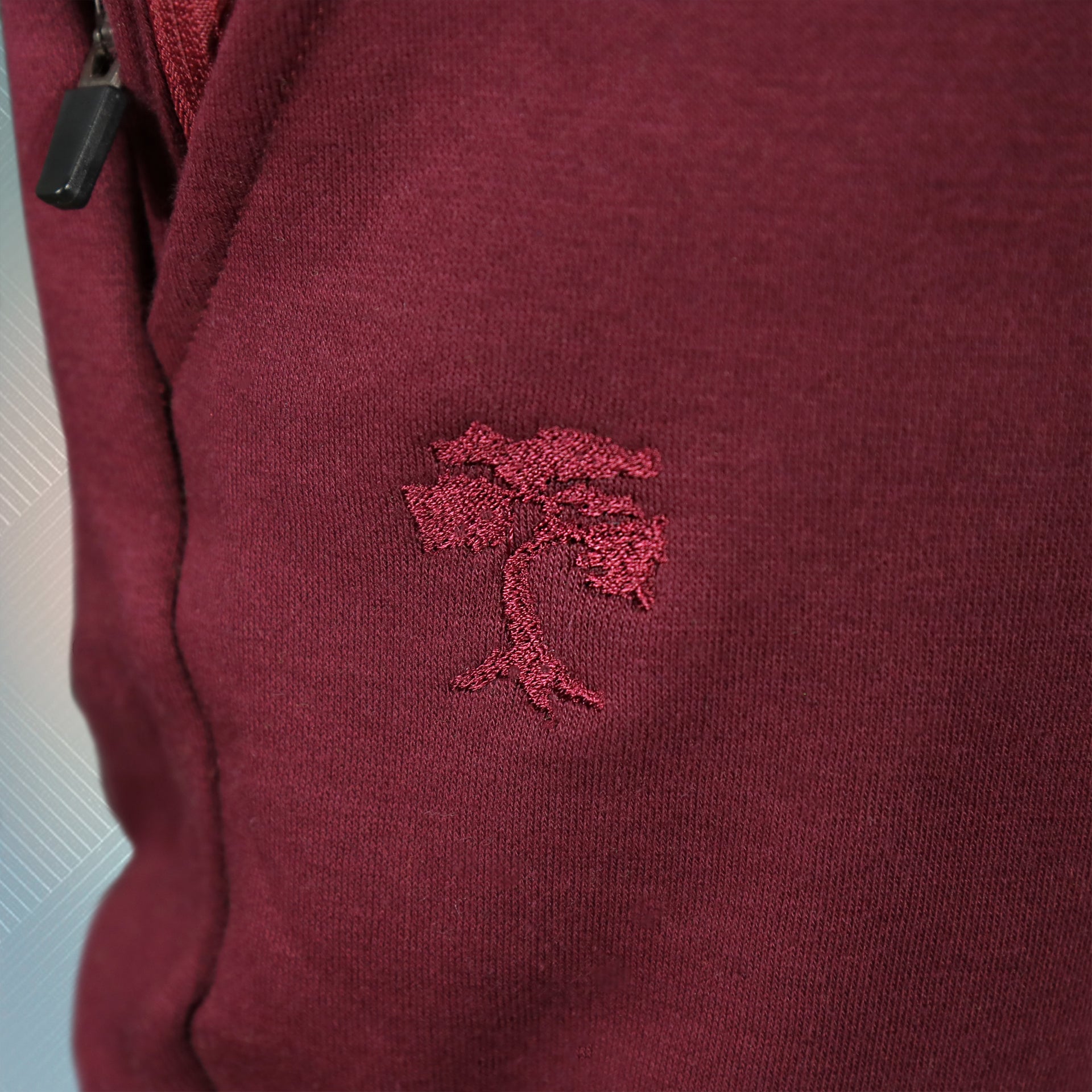 bonsai tree logo on the Maroon Unbasic Fleece Stash Pocket Sunset Park Tapered Jogger Pants | Fleece Dark Red Sweatpants