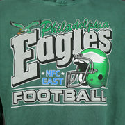 front logo on the front of the Philadelphia Eagles Sun Fade Pierce Kelly Green Pullover Hoodie | Elm Green