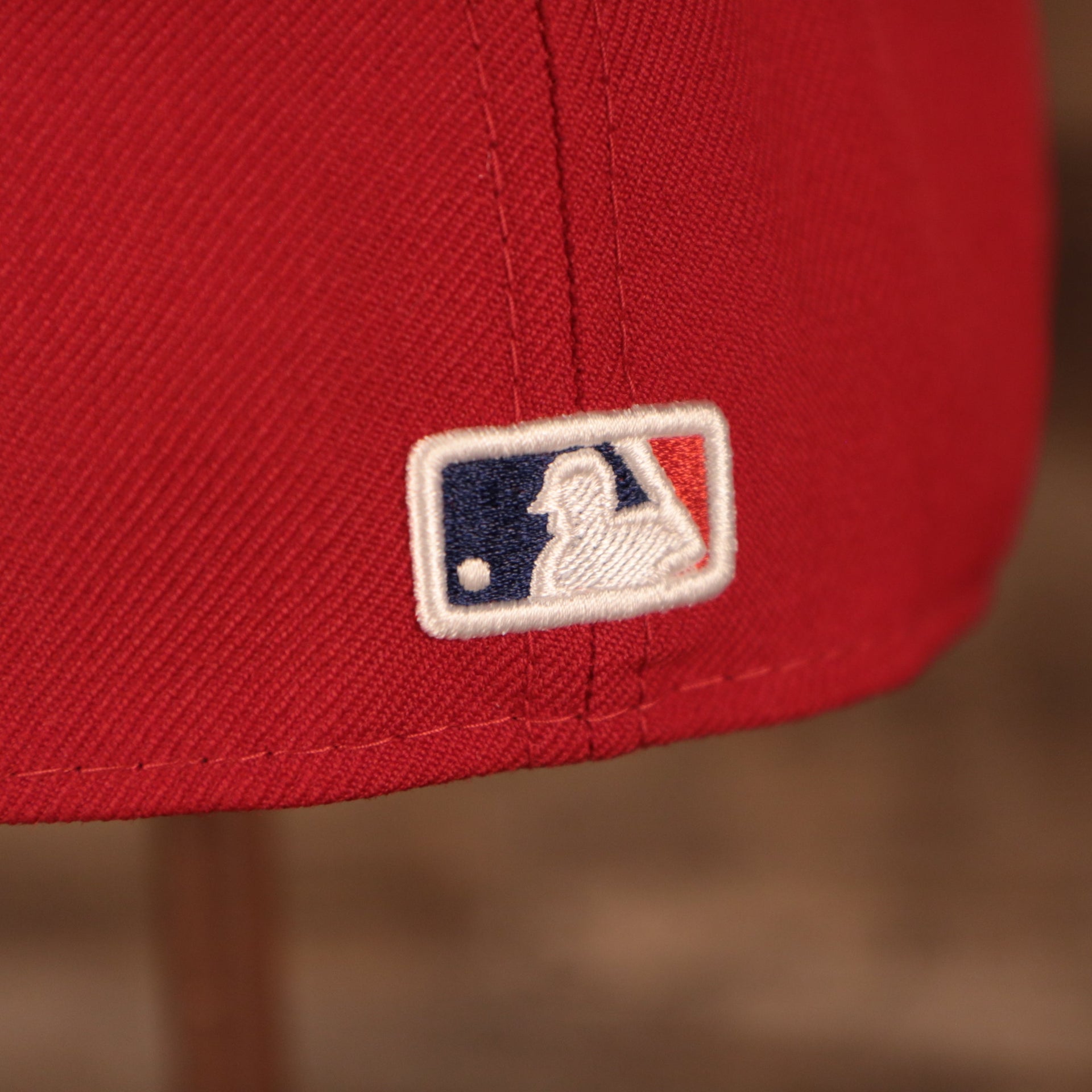 Close up of the MLB Batterman logo on the Philadelphia Phillies Upside Down Logo Gray Bottom 59Fifty Fitted Cap