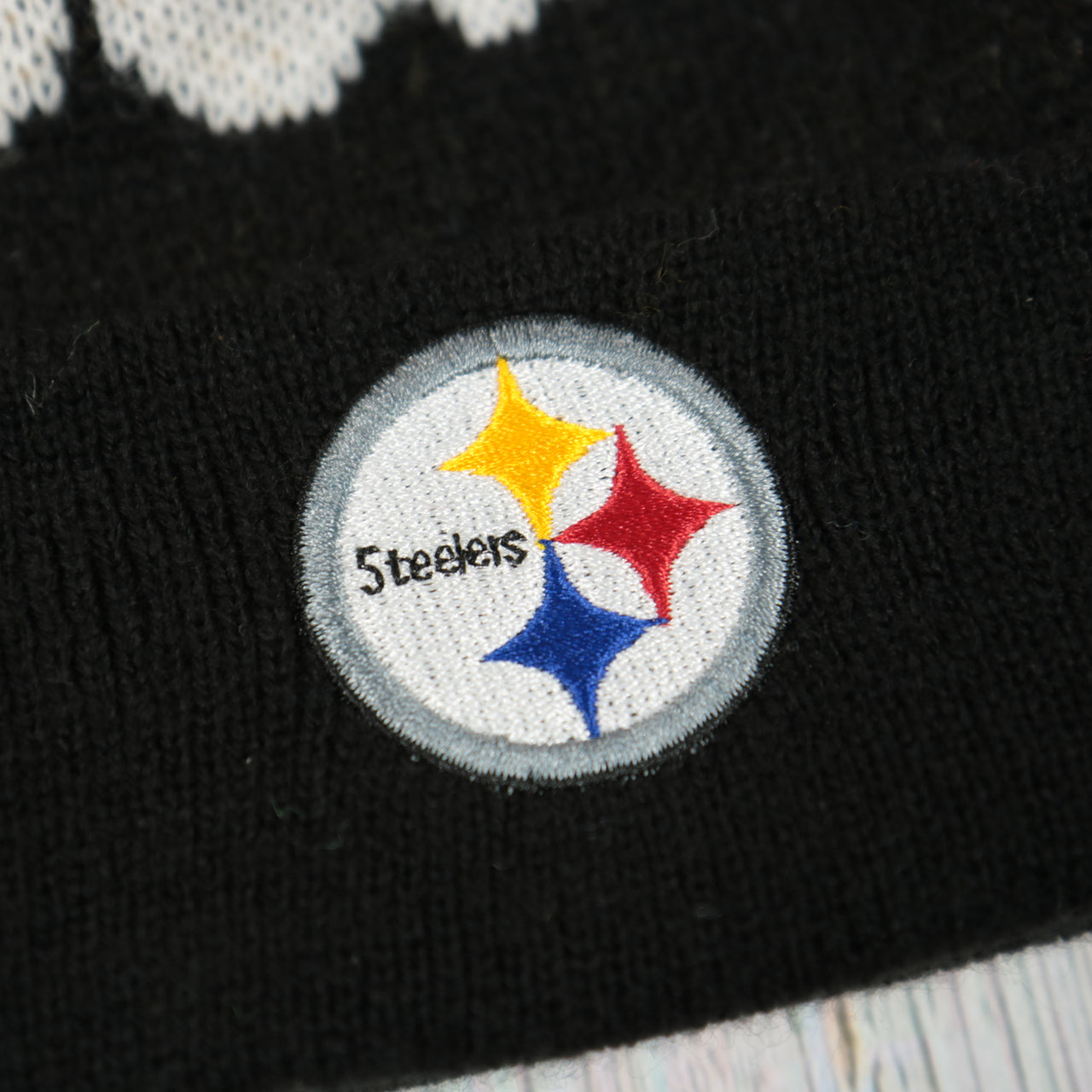 steelers logo on the Pittsburgh Steelers Youth Sized "Underdog" Knit Pom Winter Beanie