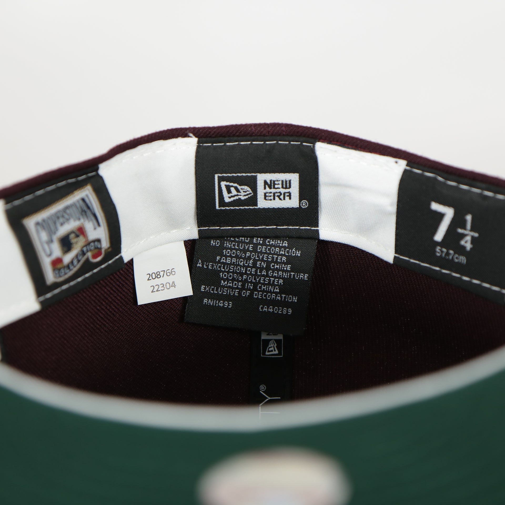 White sweatband and labels of the New York Yankees Cooperstown 50th Year Side Patch Dark Green UV 59Fifty Fitted Cap | Vintage Christmas Movie Pack