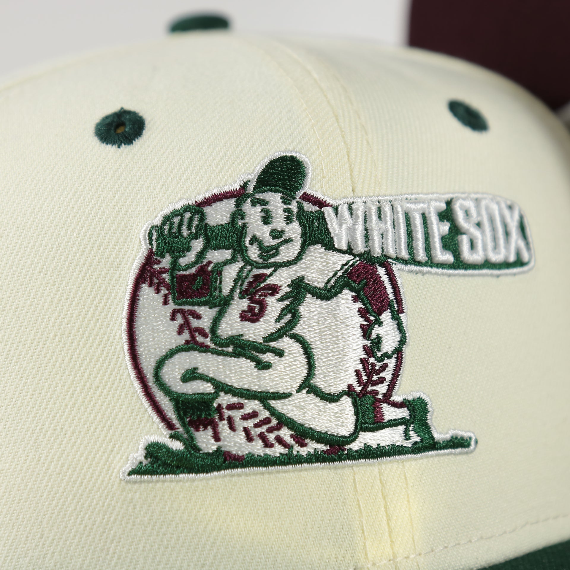Close up of the White Sox logo of the Chicago White Sox Cooperstown 75 Years Side Patch Maroon UV 59Fifty Fitted Cap | Vintage Christmas Movie Pack