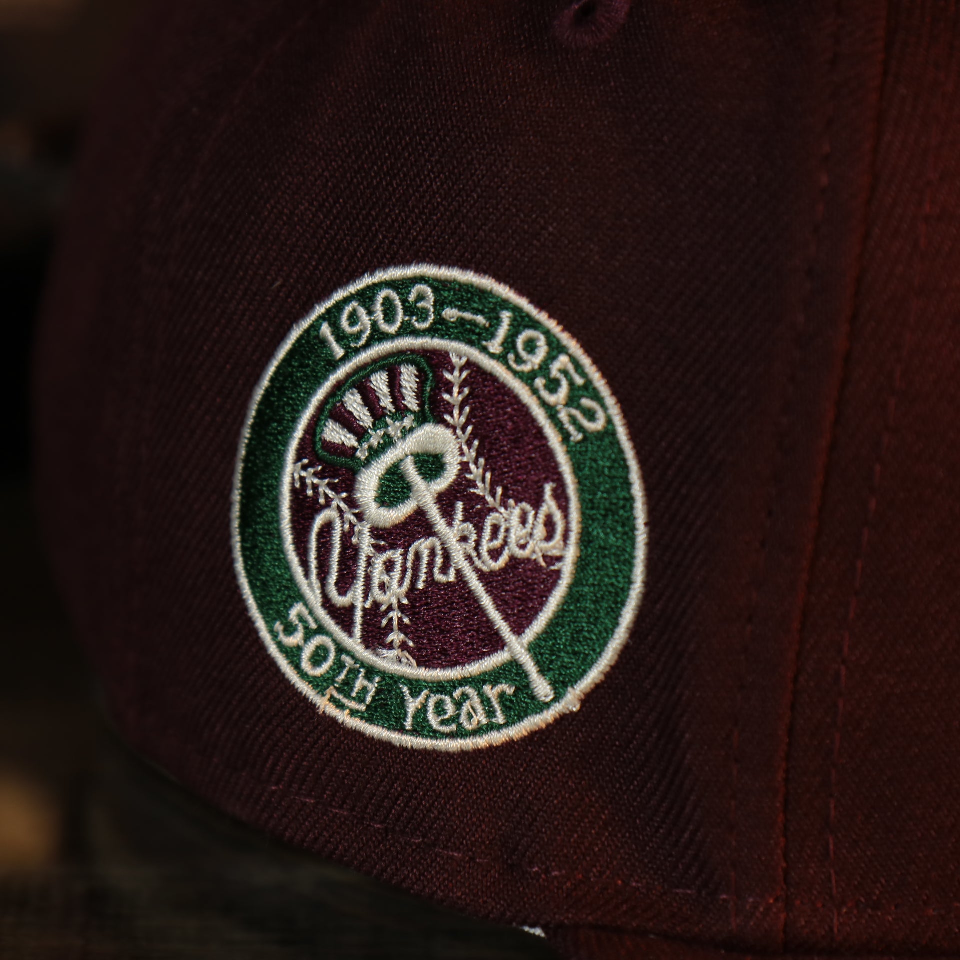 Close up of the side patch on the New York Yankees Cooperstown 50th Year Side Patch Dark Green UV 59Fifty Fitted Cap | Vintage Christmas Movie Pack