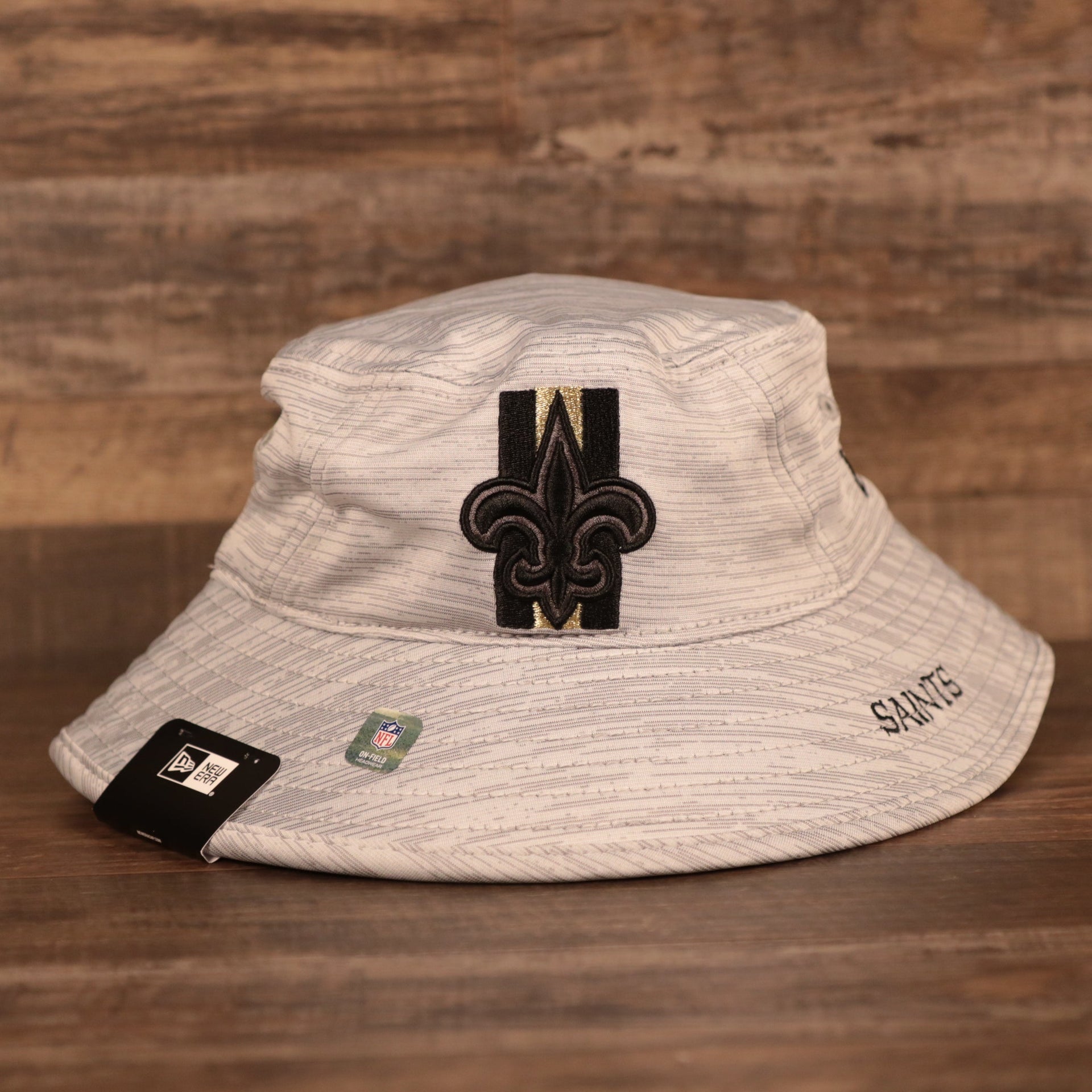 The Saints patch on the front side of the nfl training hats gray bucket hat.