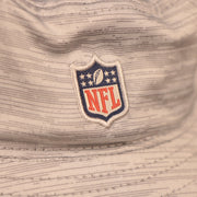 A closeup shot of the NFL patch at the back of the new era training 2021 bucket hat..