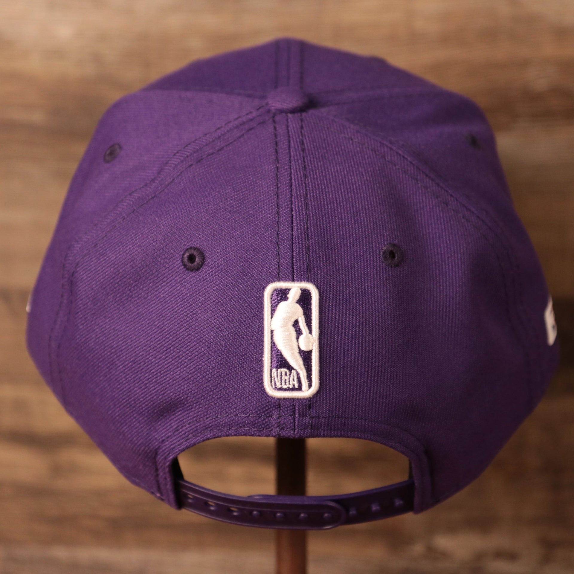back of the Los Angeles Lakers 2021 NBA Playoff Side Patch Purple 9Fifty Gray Bottom Snapback Hat