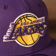 lakers logo on the Los Angeles Lakers 2021 NBA Playoff Side Patch Purple 9Fifty Gray Bottom Snapback Hat