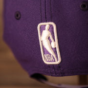 nba logo on the back Los Angeles Lakers 2021 NBA Playoff Side Patch Purple 9Fifty Gray Bottom Snapback Hat
