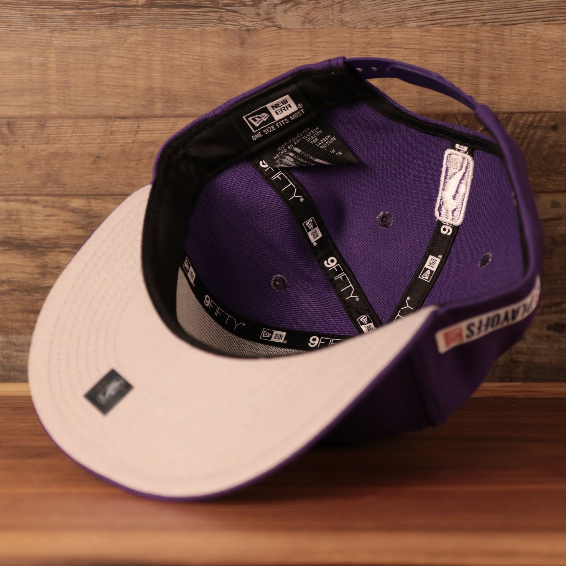 underside of the Los Angeles Lakers 2021 NBA Playoff Side Patch Purple 9Fifty Gray Bottom Snapback Hat