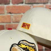 Raised minor league batterman logo on the back of the Lehigh Valley Iron Pigs Cheesesteak Without Onions Yellow UV Plain Jane 59Fifty Fitted Cap | Cap Swag Exclusive