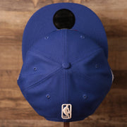 top of the Philadelphia 76ers 2021 NBA Playoffs Royal Blue 9Fifty Gray Bottom Snapback Hat