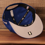 underside of the Philadelphia 76ers 2021 NBA Playoffs Royal Blue 9Fifty Gray Bottom Snapback Hat
