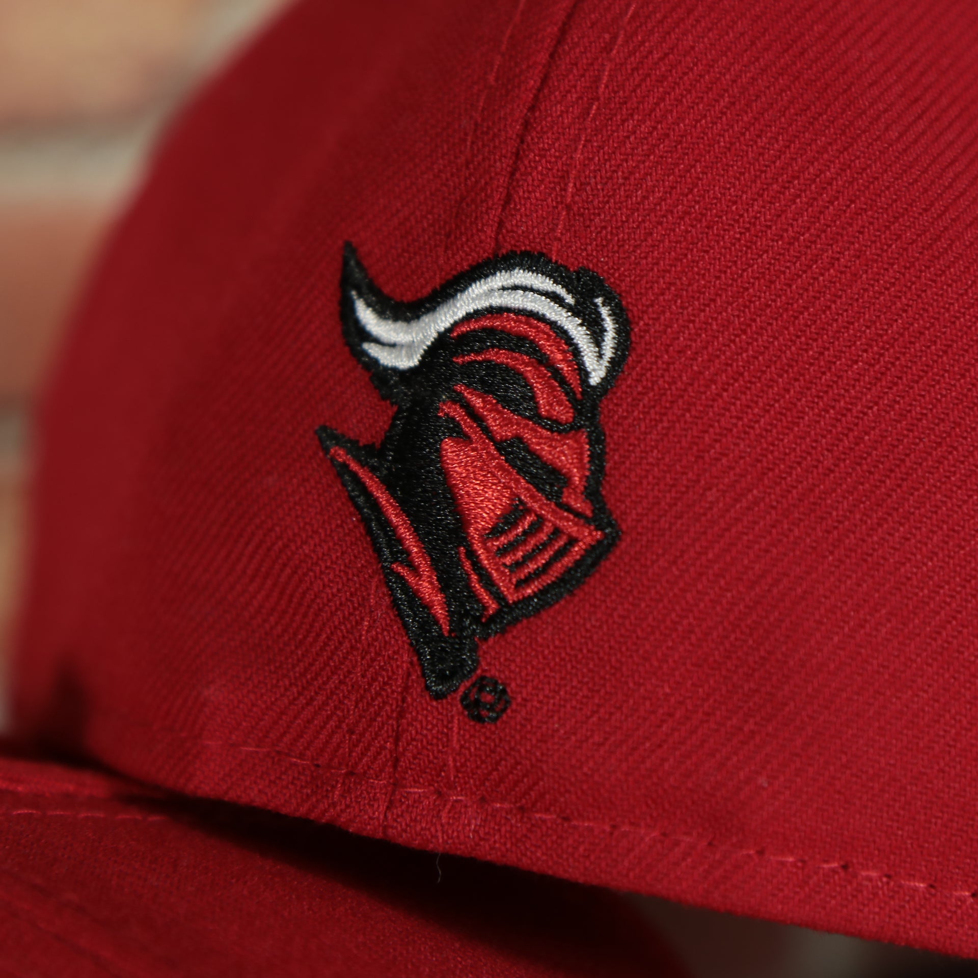 scarlet knights logo on the backside of the Rutgers Scarlet Knights Red Underbrim 59Fifty Fitted Cap | Red Fitted Cap