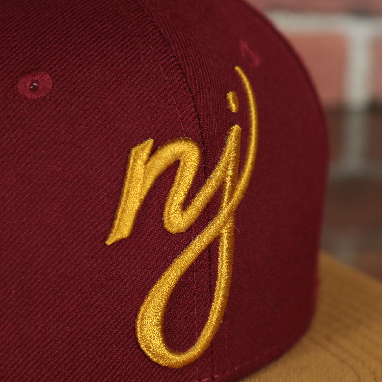 nj logo on the front of the New Jersey "NJ" Hat | New Jersey Garden State 9Fifty Gray Bottom Snapback Hat | Maroon / Gold *DISCOLORED