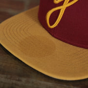 discolored brim on the New Jersey "NJ" Hat | New Jersey Garden State 9Fifty Gray Bottom Snapback Hat | Maroon / Gold *DISCOLORED